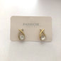 Aretes Lazo Dorado con Cristal Central