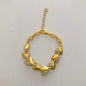 Pulsera “Hojas Doradas”