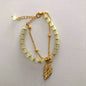 Pulsera Doble Elegancia Hoja Dorada